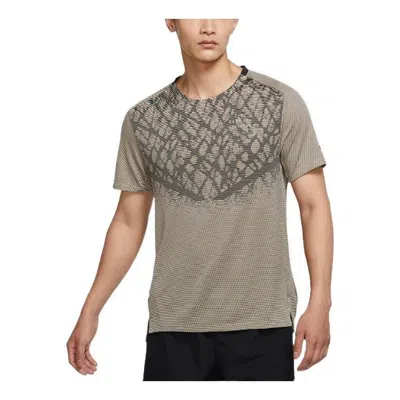 Nike Dri-fit Adv Run Division Techknit Reflective Design Running Short Sleeve Olive Grey In Brown