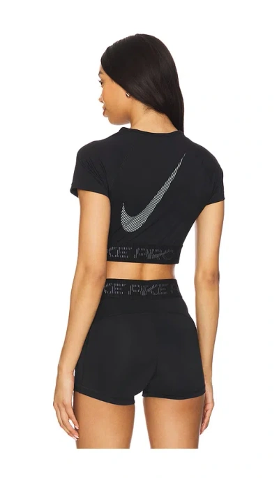 Nike Dri-fit Cropped Graphic Short Sleeve Top In Black  Cool Grey  & White