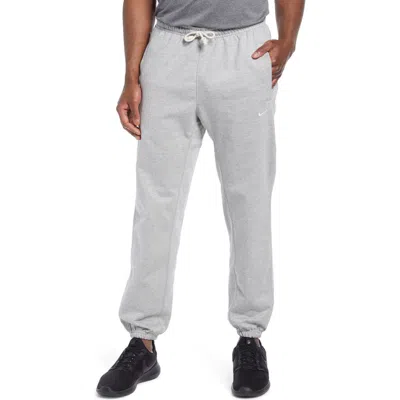 Nike Dri-fit Standard Issue Joggers In Dark Grey Heather/pale Ivory