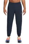Nike Dri-fit Tapered Versatile Pants In Obsidian/black/silver
