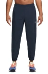 Nike Dri-fit Tapered Versatile Pants In Obsidian/black/silver