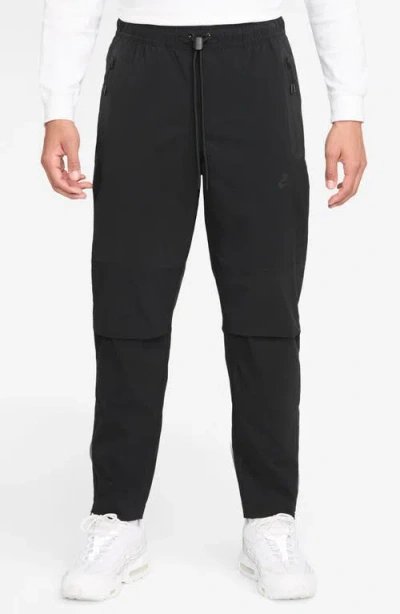 Nike Dri-fit Tech Woven Pants In Black