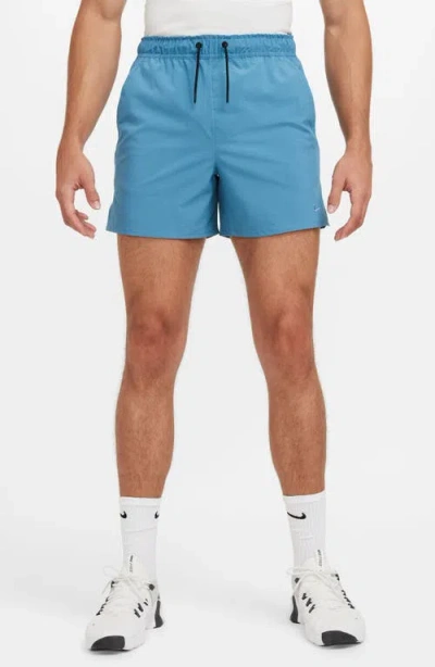 NIKE NIKE DRI-FIT UNLIMITED 5-INCH ATHLETIC SHORTS