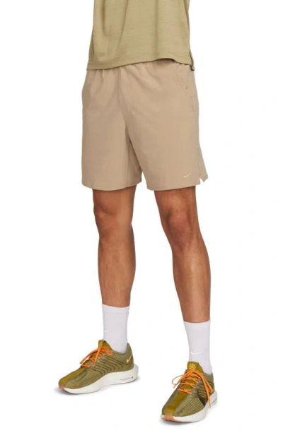 Nike Training Dri-fit Unlimited Woven 7inch Shorts In Beige-green In Brown