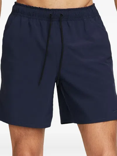Nike Dri-fit Unlimited Woven Performance Track Pants In Blue