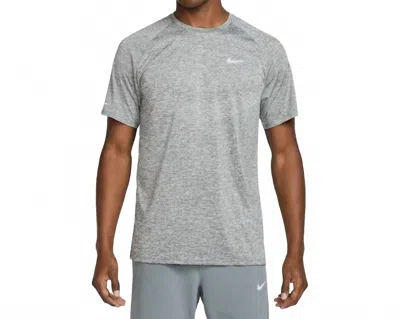 Nike Dri-fit Advanced Stride Short Sleeve Top In Smoke Grey Heather Reflective Silver In Gray