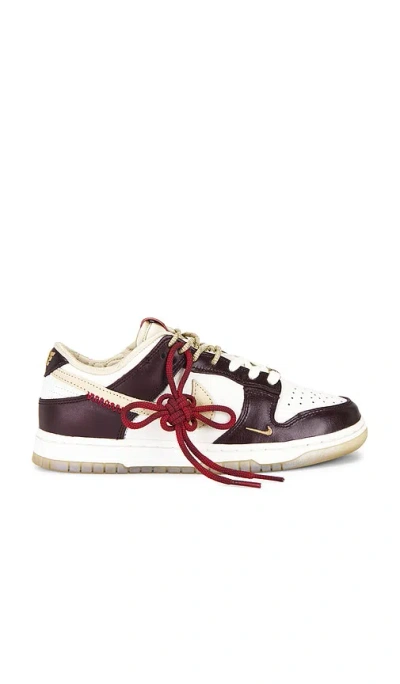 Nike Dunk Low Lx Sneaker In Sail  Team Gold  & Burgundy Crush