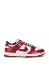 Nike Dunk Low Sneaker In White/red