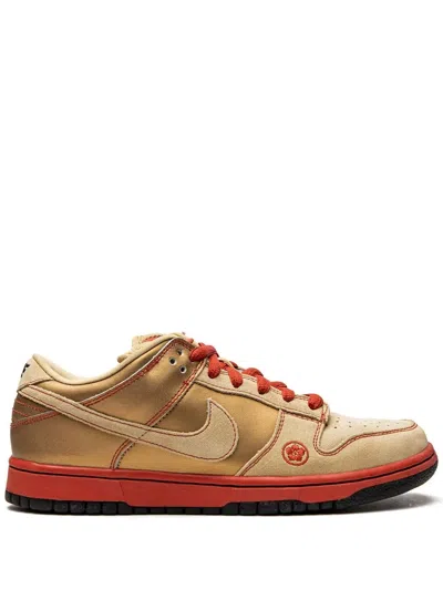 Nike Dunk Low Pro Sb Sneakers In Gold