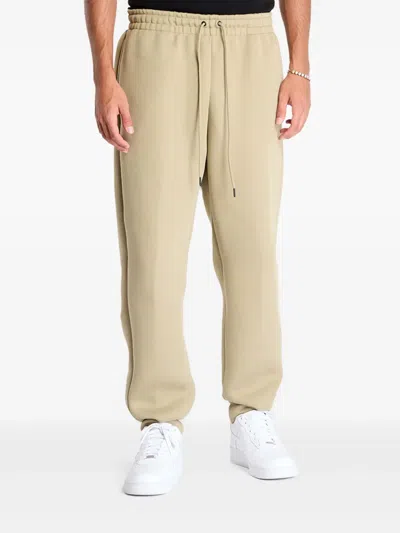 Nike Elastic-waistband Fleece Trousers In Neutral