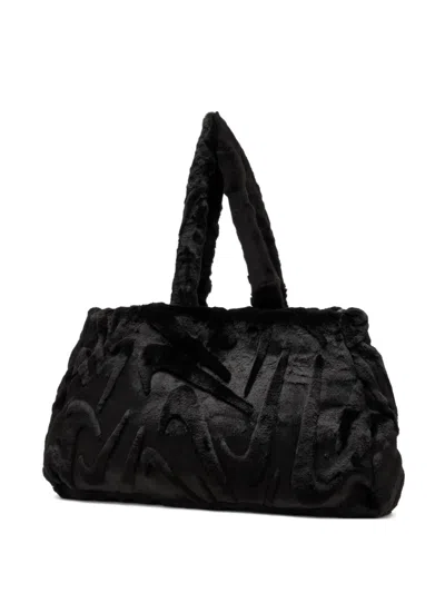 Nike Embossed Faux Fur Tote Bag In Black