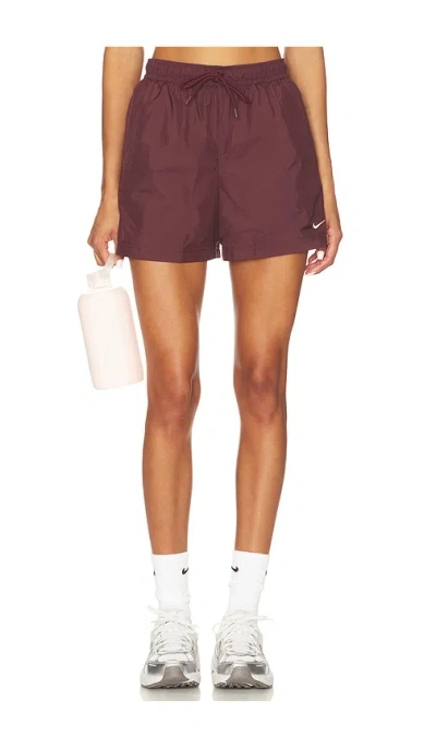 Nike Essential Woven Mid Rise Short In Purple