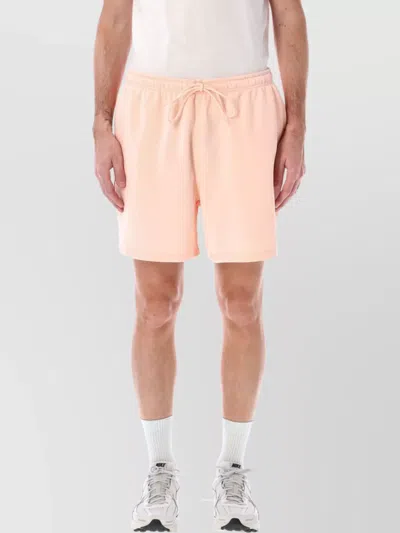 Nike Fleece Club Short Pockets In Pink