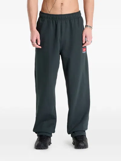 Nike Fleece Tie-hem Track Pants In Green