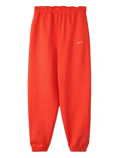 Nike Fleece Track Pants In Orange