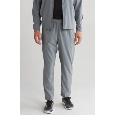 Nike Form Dri-fit Versatile Pants In Smoke Grey/black/silver