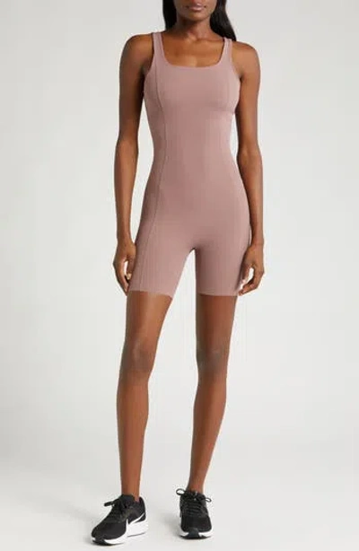 Nike Infinasoft Essentials Dri-fit Romper In Smokey Mauve/white