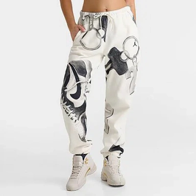 Nike Jordan Women's Brooklyn Fleece All-over Print Joggers Pants In Sail/black