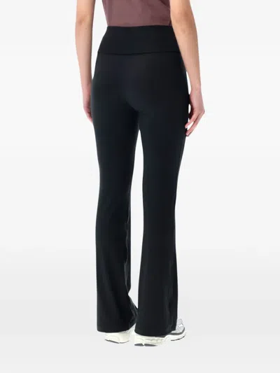 Nike Logo-detail Flared Leggings In Black