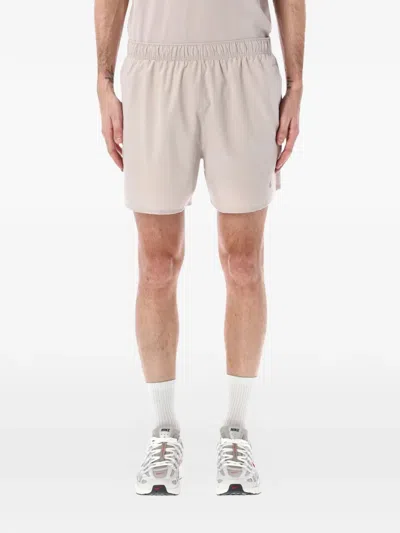 Nike Logo-detail Running Shorts In Neutral