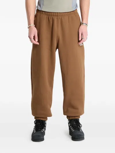 Nike Logo Elasticated Trousers In Brown