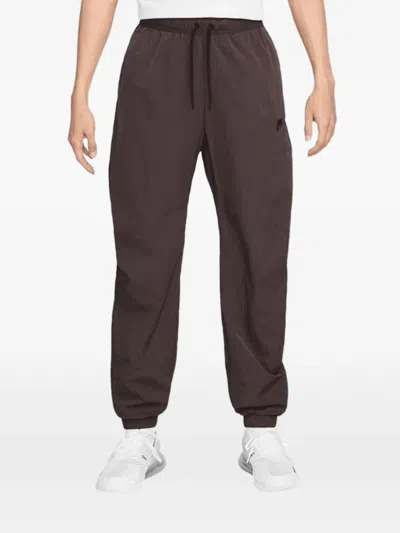 Nike Logo-embroidered Track Pants In Brown