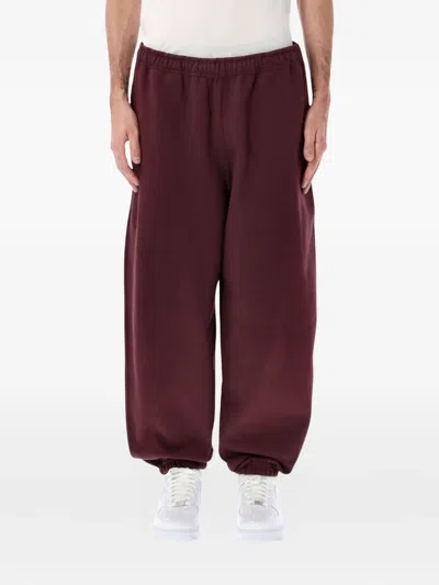 NIKE LOGO-EMBROIDERED TRACK PANTS