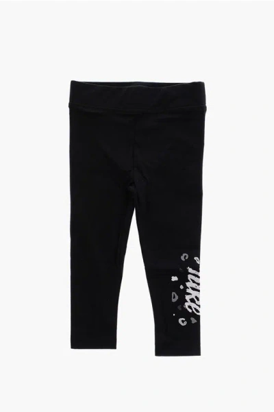 Nike Logo Printed Solid Color Leggings In Black