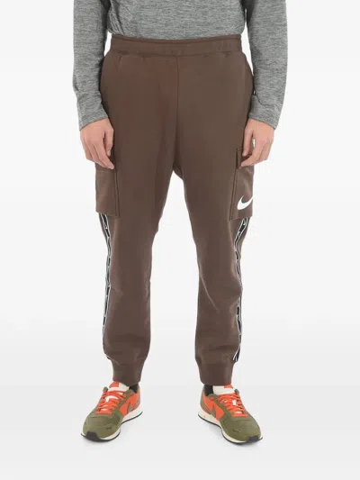Nike Logo-stripe Cargo Pants In Brown