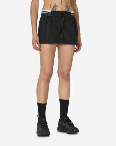 NIKE LOW-RISE CANVAS MINI SKIRT BLACK