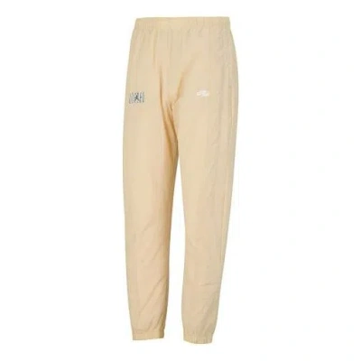 Nike M J Flt Mvp Stmt Wvn Pant In Neutral