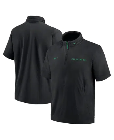 Nike Men's Black Oregon Ducks 2024 Sideline Coach Short Sleeve Half-zip Hoodie Jacket In Black,green