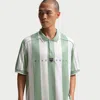 Nike Stripe Short Sleeve Polo In Gray