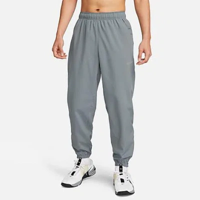 Nike Men's Form Dri-fit Tapered Versatile Pants In Smoke Grey/black/reflective Silver