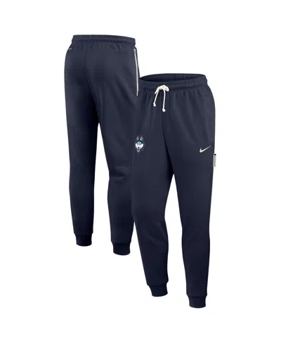 NIKE MEN'S NAVY UCONN HUSKIES 2025 SIDELINE PERFORMANCE TAPER PANTS