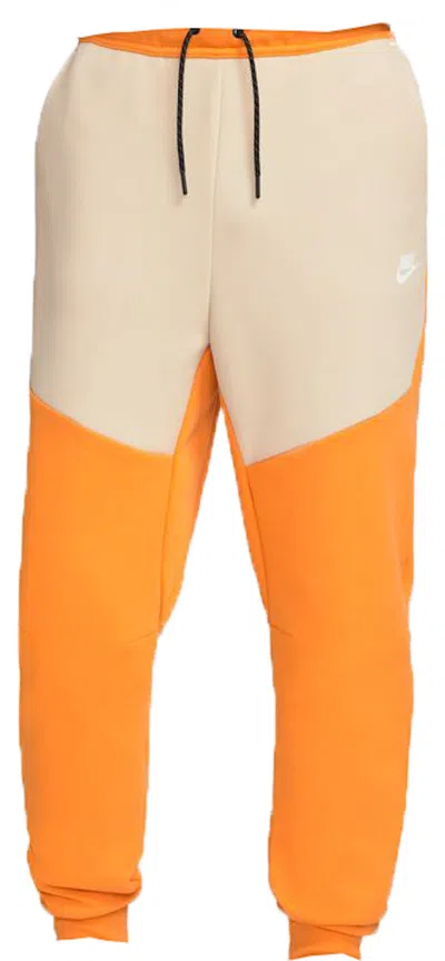 Pre-owned Nike Men's  Sportswear Tech Fleece Joggers In Kumquat/sanddrift In Orange