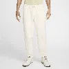 Nike Men's Primary Fleece Dri-fit Uv Tapered Performance Pants In Brown