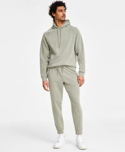 Nike Men's Primary Dri-fit Uv Versatile Joggers In Green