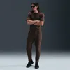 Nike Men's Primary Fleece Dri-fit Uv Tapered Performance Pants In Brown