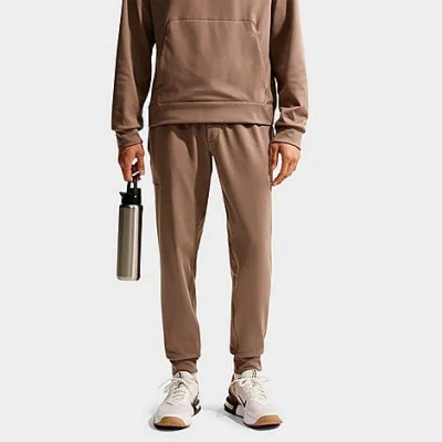 Nike Men's Primary Nanoknit Dri-fit Uv Protection Performance Jogger Pants In Brown