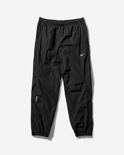 Nike Men S Nocta Woven Track Pants In Black