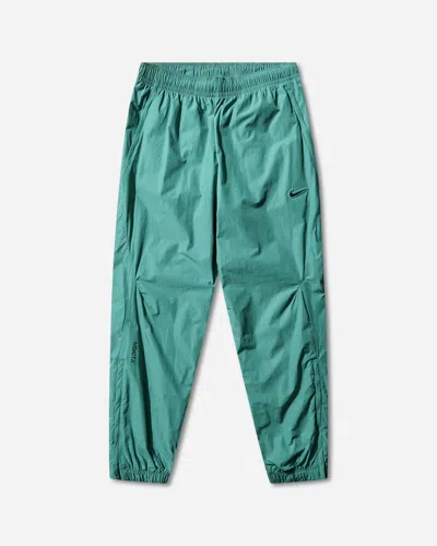 Nike Men S Nocta Woven Track Pants Neptune In Green