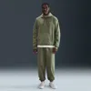 Nike Men's Solo Swoosh Cuffed Fleece Pants In Green