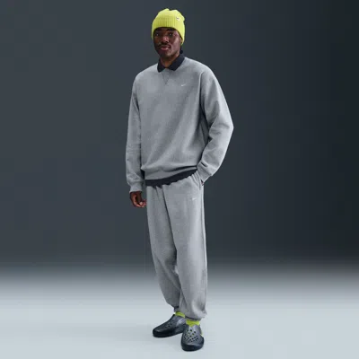 NIKE MEN'S SOLO SWOOSH CUFFED FLEECE PANTS,1015750942