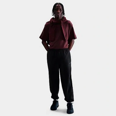 NIKE MEN'S SOLO SWOOSH CUFFED FLEECE PANTS