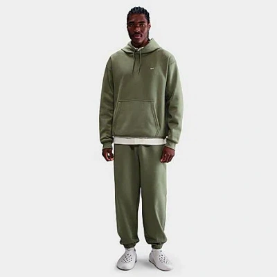 NIKE MEN'S SOLO SWOOSH CUFFED FLEECE PANTS