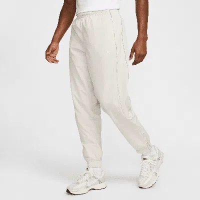 NIKE MEN'S SOLO SWOOSH TRACK PANTS,1015652429