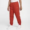 Nike Men's Solo Swoosh Track Pants In Dragon Red/white