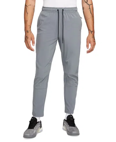 NIKE MEN'S UNLIMITED DRI-FIT TAPERED-LEG DRAWSTRING PANTS