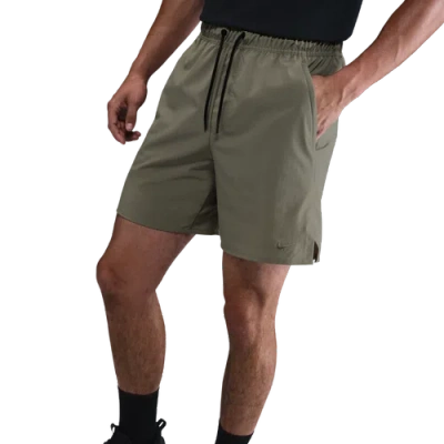 Nike 7 Dri-fit Unlimited Woven Unlined Shorts In Green